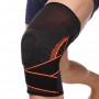 Наколенник-бандаж Knee Brace с силиконовым кольцом, ремнем и спиральными ребрами жесткости (718CA)